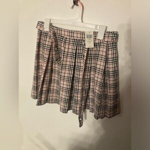 Hot Topic plaid skirt in size large & pink in color. NWT. See pictures